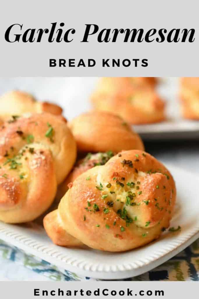 Bread knots on a beige platter. The image has a grey top and bottom border. Pinterest Pin #1.