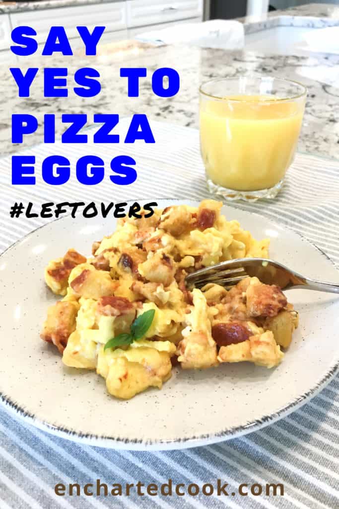 Scrambled eggs and chopped pizza plated on a striped placemat with orange juice. The words "Say Yes to Pizza Eggs" and "#leftovers are superimposed in the left corner of the image.
