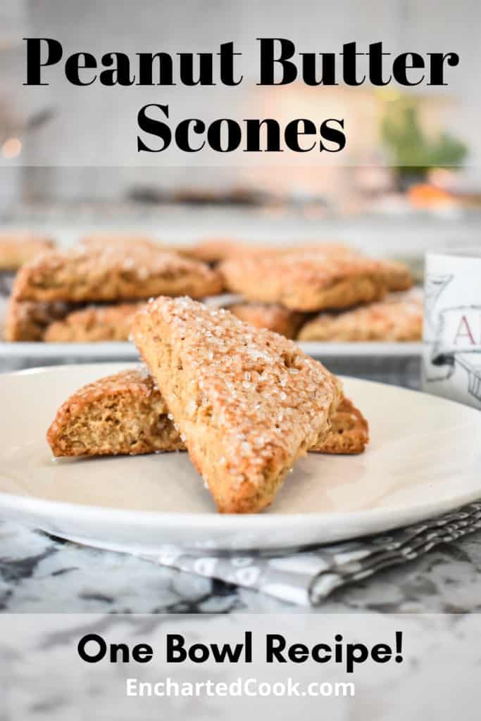 Two Scones on a white plate and a platter of scones are in the background. The words "Peanut Butter Scones" and "One Bowl Recipe!" are in black lettering. Pinterest Pin-1B.