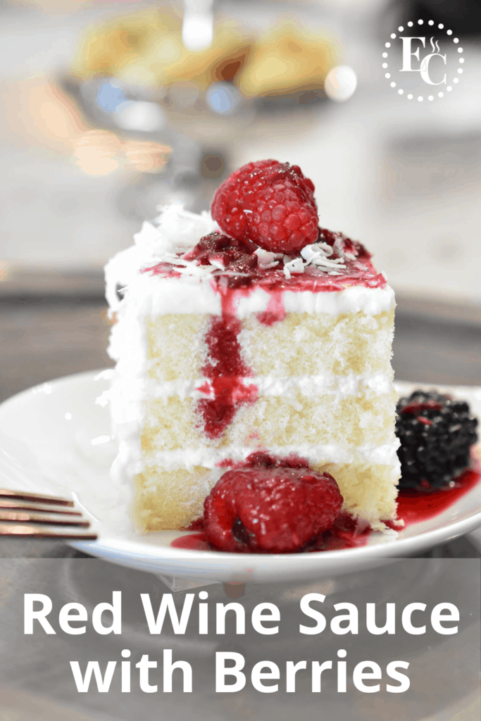 Vertical image of a slice of coconut cake topped with red berry sauce. Pinterest Pin #3