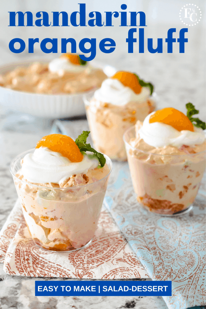Portrait image of orange fluff in small cups and a bowl. Each serving is garnished with whipped topping, a mandarin orange, and a sprig of mint. Pinterest PIN #6