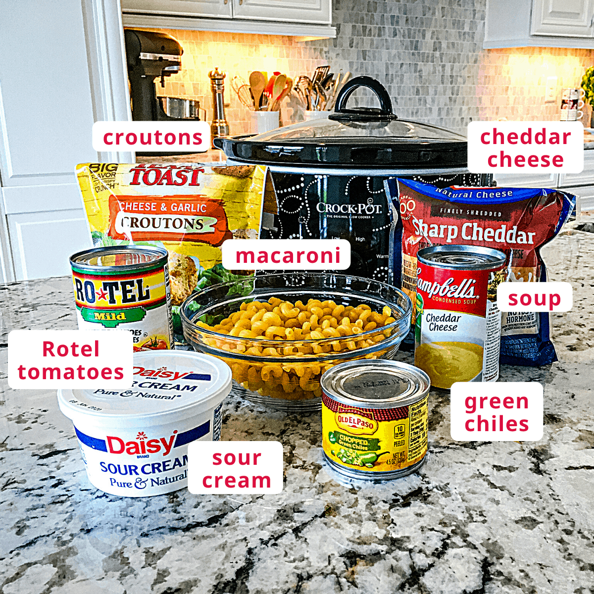 ngredients, clockwise from top right: shredded cheddar cheese, cheddar cheese soup, green chilies, sour cream, Rotel tomatoes, croutons, macaroni.