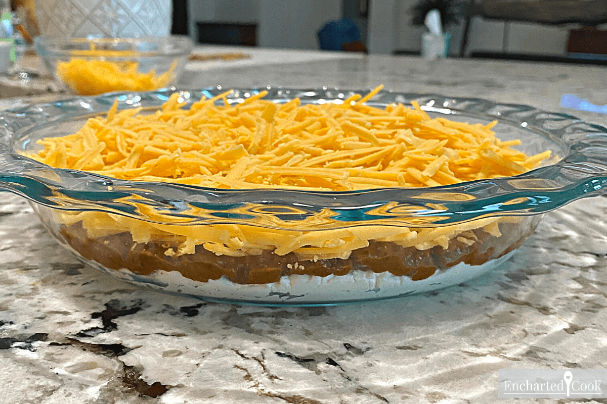 Side view of layered dip ready for the oven.