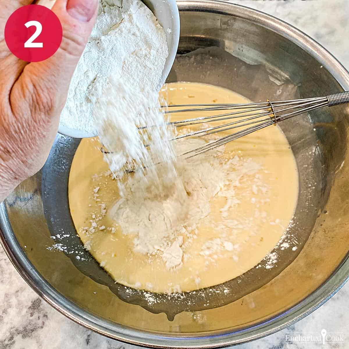 Adding flour to the wet ingredients to make the batter.