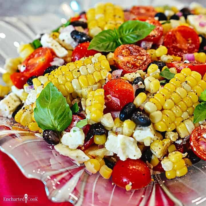 Corn salad in a glass dish.