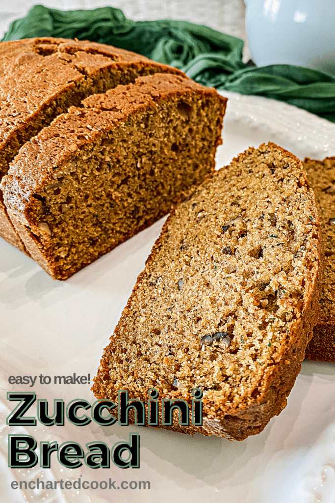 Zucchini bread on a white platter with text overlay.