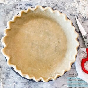 A single crust pie shell ready to bake.