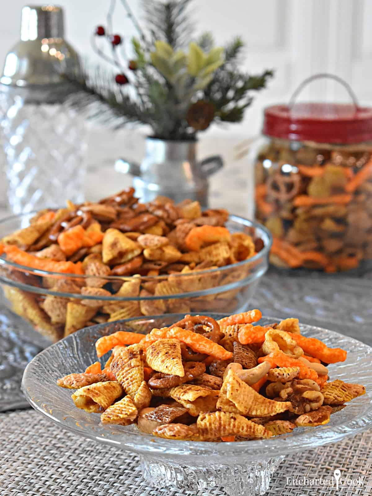 Snack mix in a dish, a bowl and a jar.