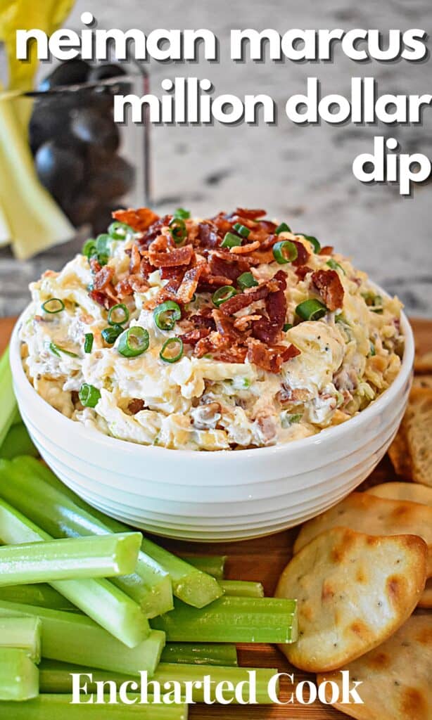 A dip in a white bowl topped with bacon and green onion surrounded by celery sticks and crackers with text overlay.