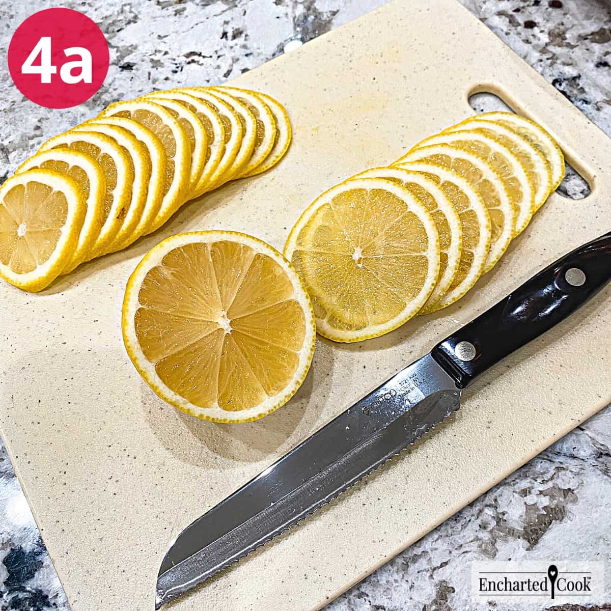 Process Photo 4a - Slicing the lemon thinly on a cutting board.