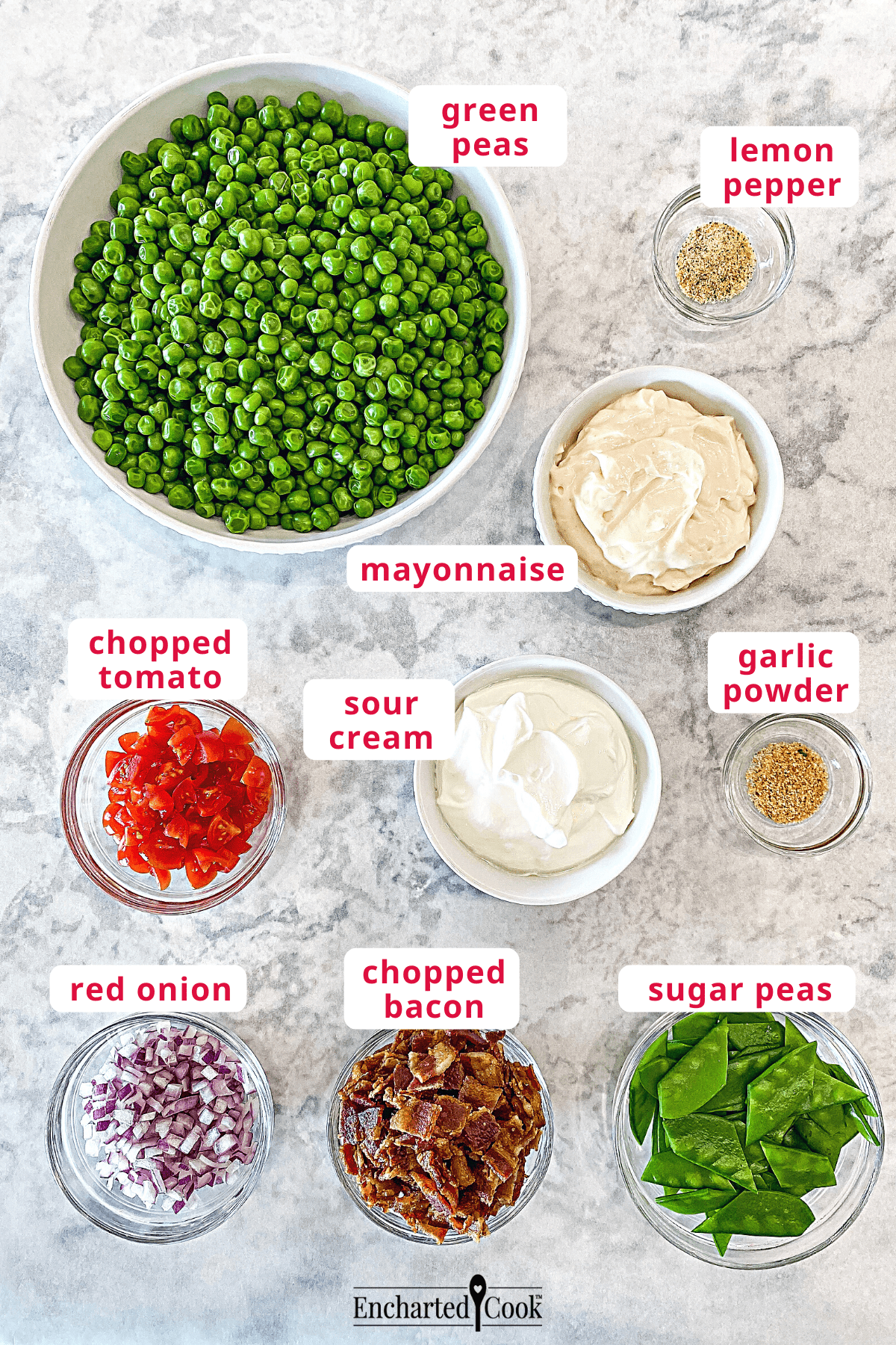 The ingredients, clockwise from top left: green peas, lemon pepper, mayonnaise, sour cream, garlic powder, sugar peas, chopped bacon, minced red onion, and chopped tomato.