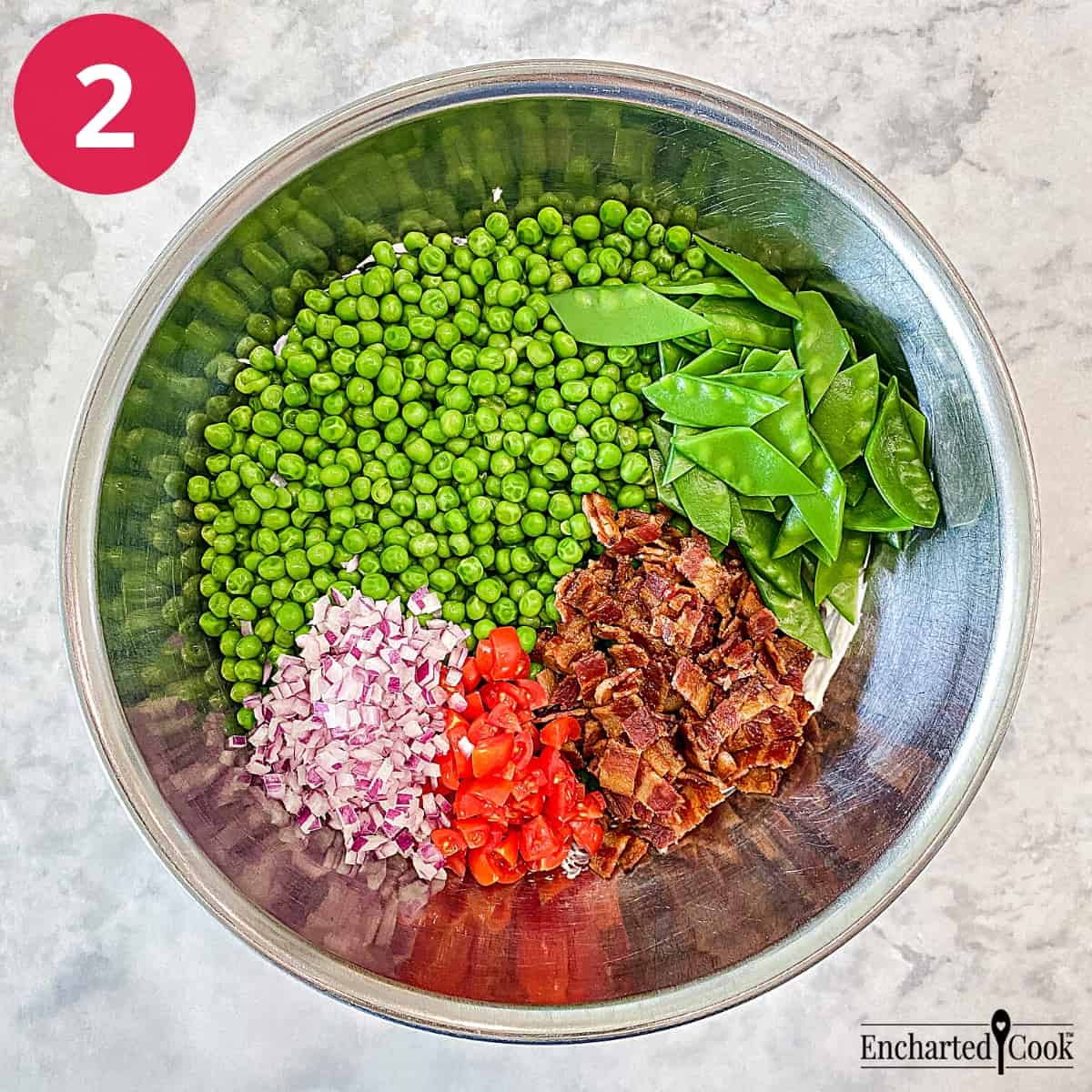 Process Photo 2 - Adding the peas, sugar peas, chopped bacon, chopped tomato, and minced red onion to the dressing in a large mixing bowl.