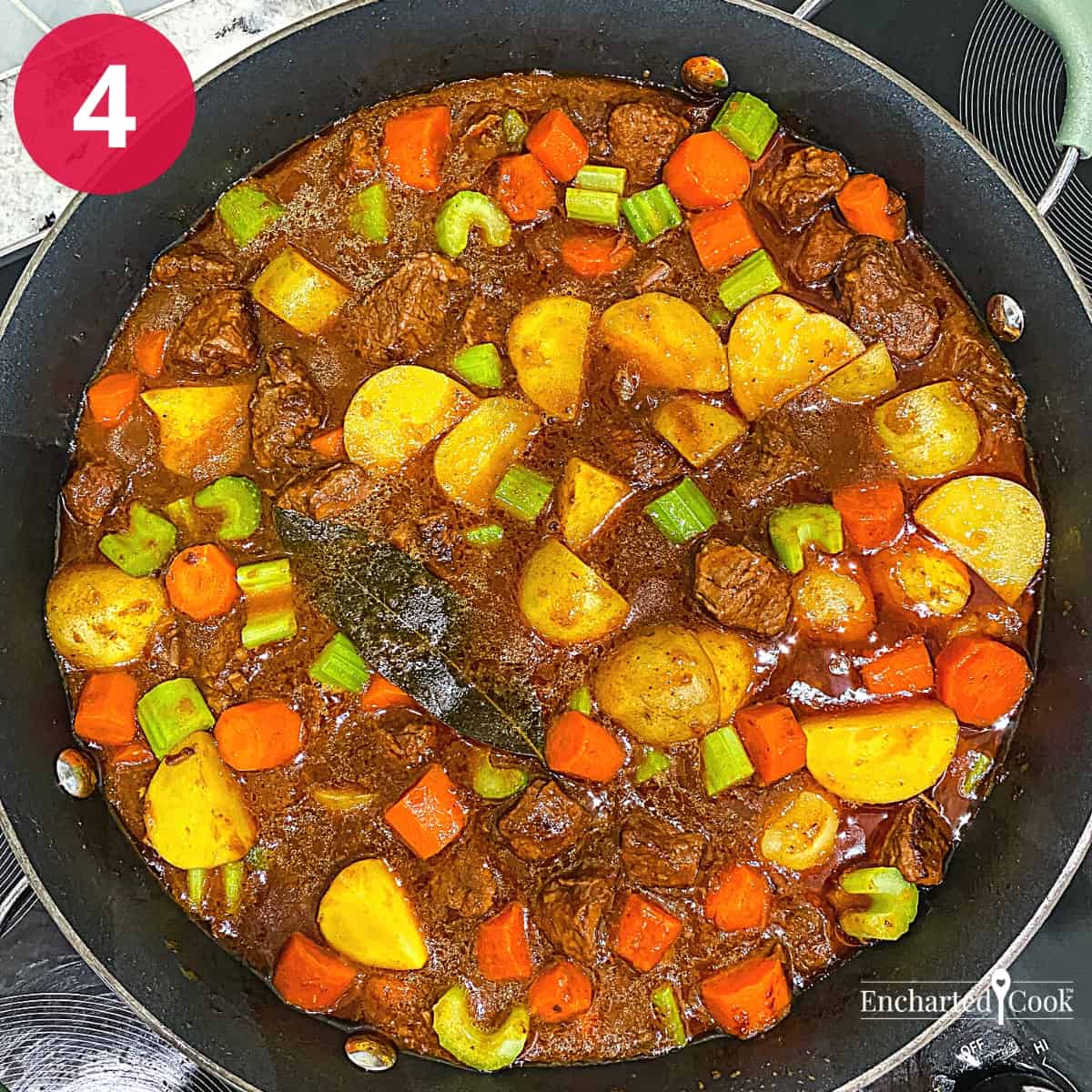 Process Photo 4 - Cut carrots, potatoes, and celery are added in stages to the beef stew.