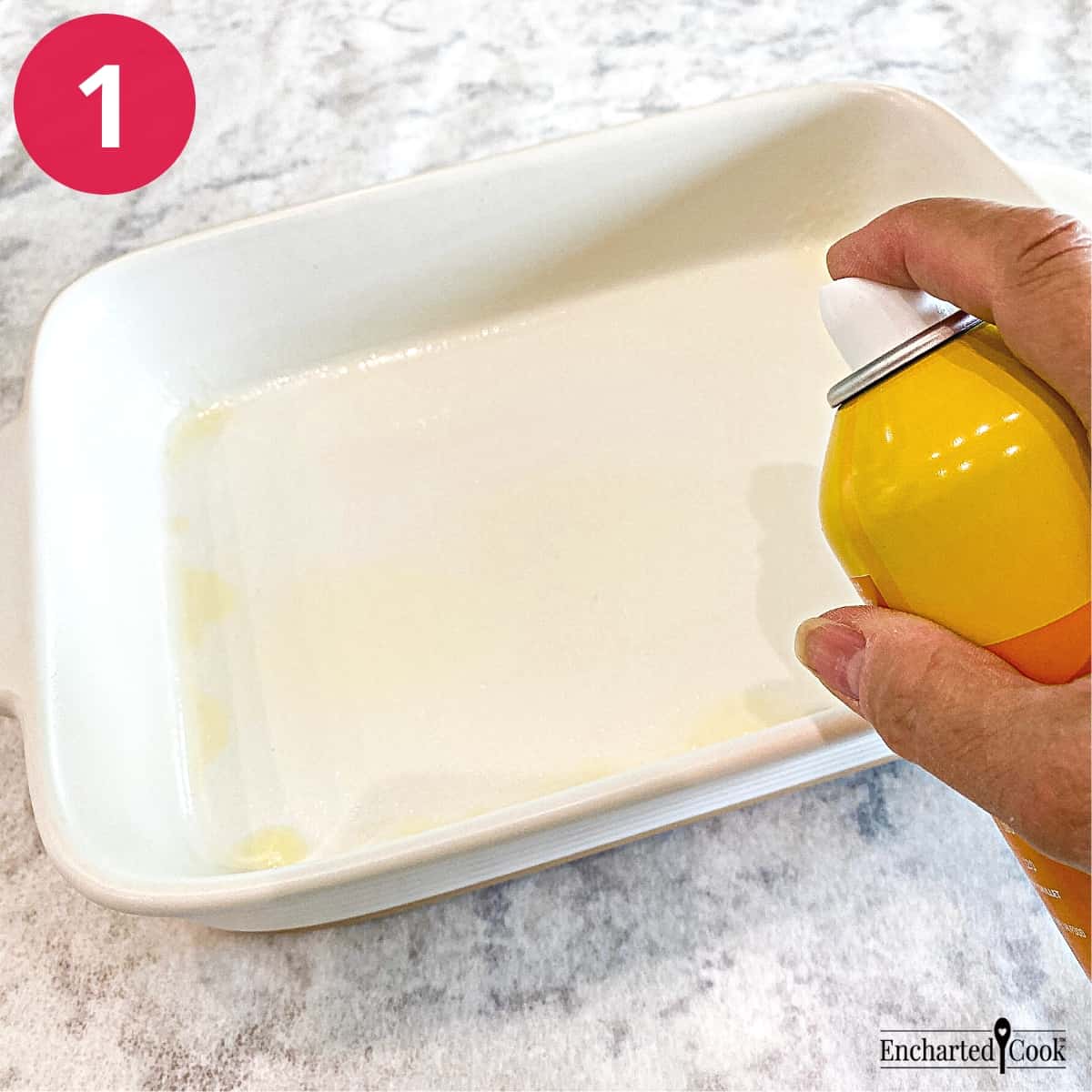 Process Photo 1 - A large white baking dish is greased with non-stick cooking spray.