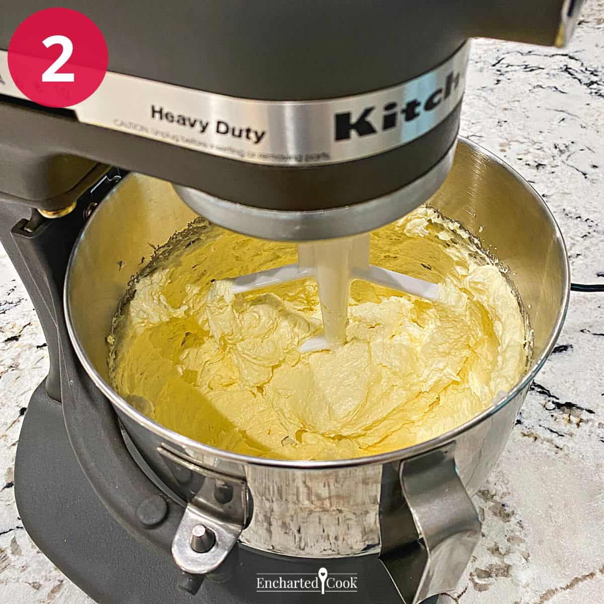 Process Photo 2 - Eggs and flavorings are added to the butter and sugar creamed mixture and beaten until light and fluffy in the bowl of a large stand mixer.