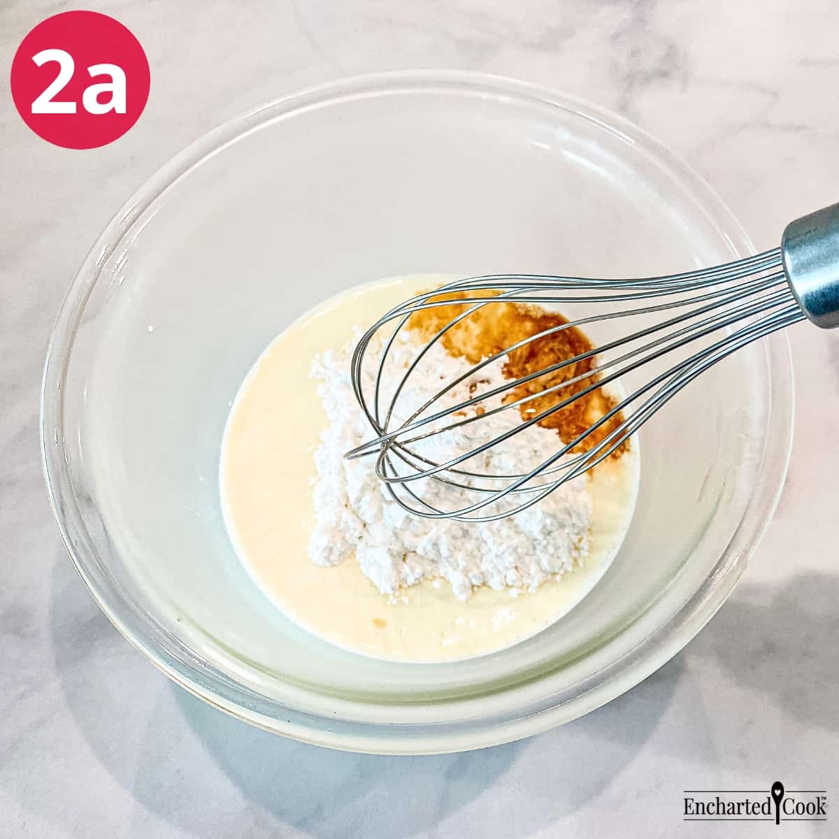 Process Photo 2a - The heavy cream, sugar, and vanilla extract in a chilled, deep bowl is ready to be beaten.