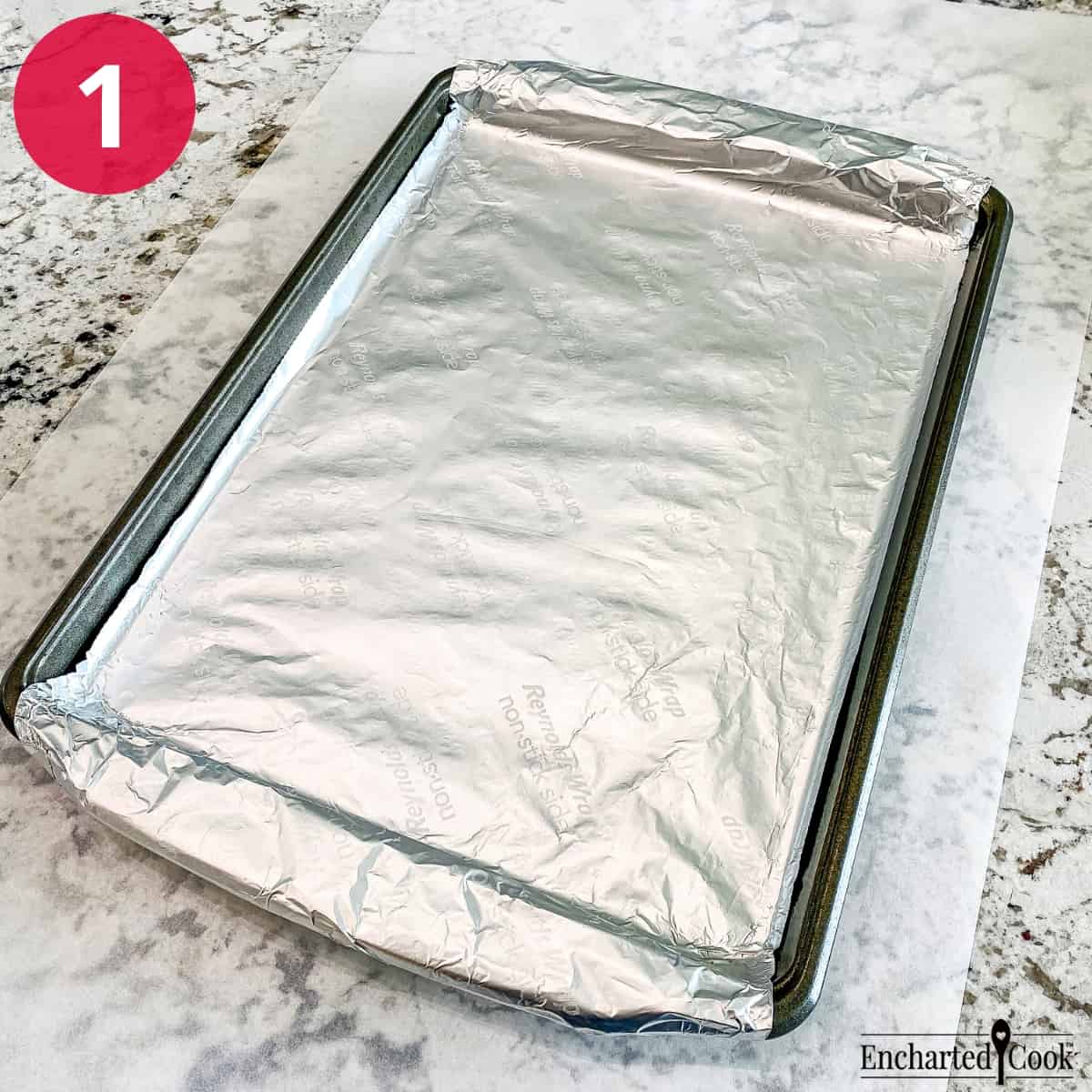 Process Photo 1 - A large rimmed baking pan is lined with aluminum foil.