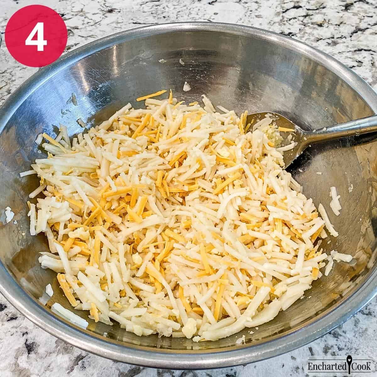 Process Photo 4 - Shredded cheddar cheese is mixed into the hash browns.