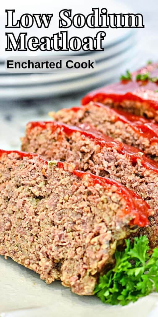 Meatloaf sliced on a white plate is garnished with parsley with text overlay.
