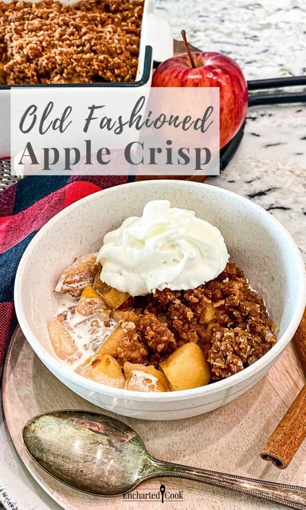 A bowl of cooked sliced apples with a crisp streusel topping and whipped cream with text overlays.