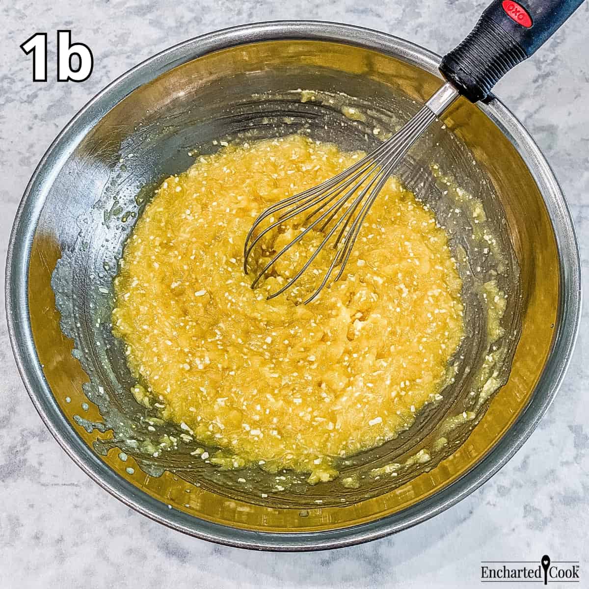 Process Photo 1b - The crushed pineapple and the coconut cream pudding mix are mixed together in a large bowl.