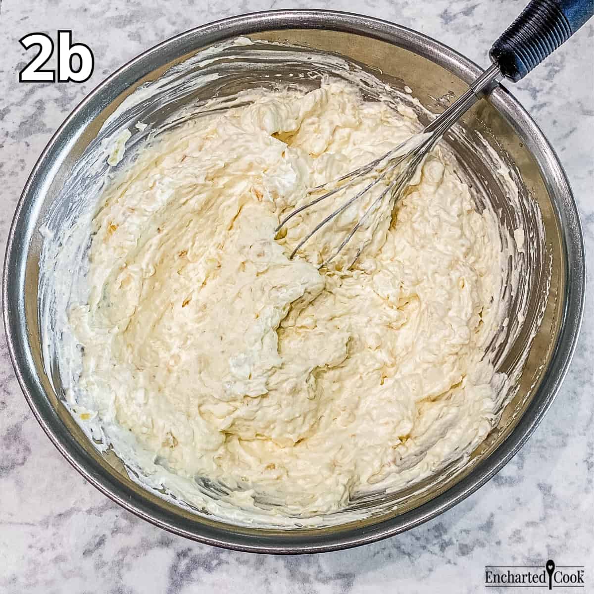Process Photo 2b - Whipped topping is mixed into the pineapple and pudding mixture.