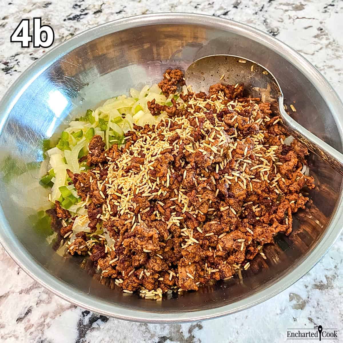 Process Photo 4b - The seasoned brown beef and rice are added to the mixing bowl containing the cooked onions and bell peppers.