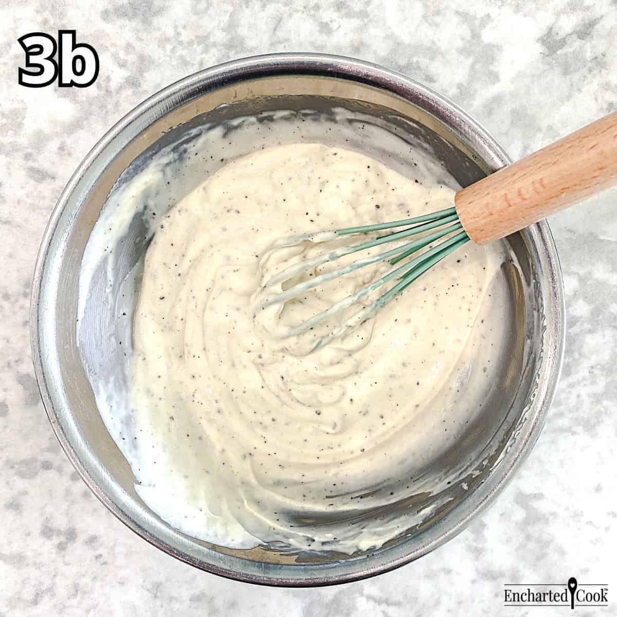 Process Photo 3b - The salad dressing mixed in a small bowl with a whisk.