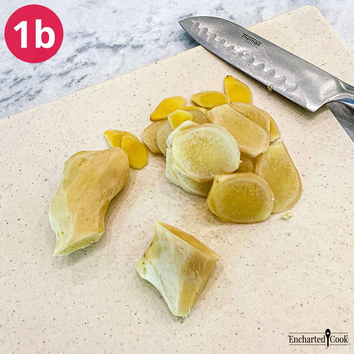 Process Photo 1b - Ginger root peeled and sliced on a cutting board.
