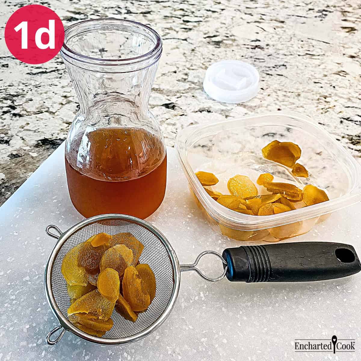 Process Photo 1d - Straining the ginger simple syrup into a carafe.