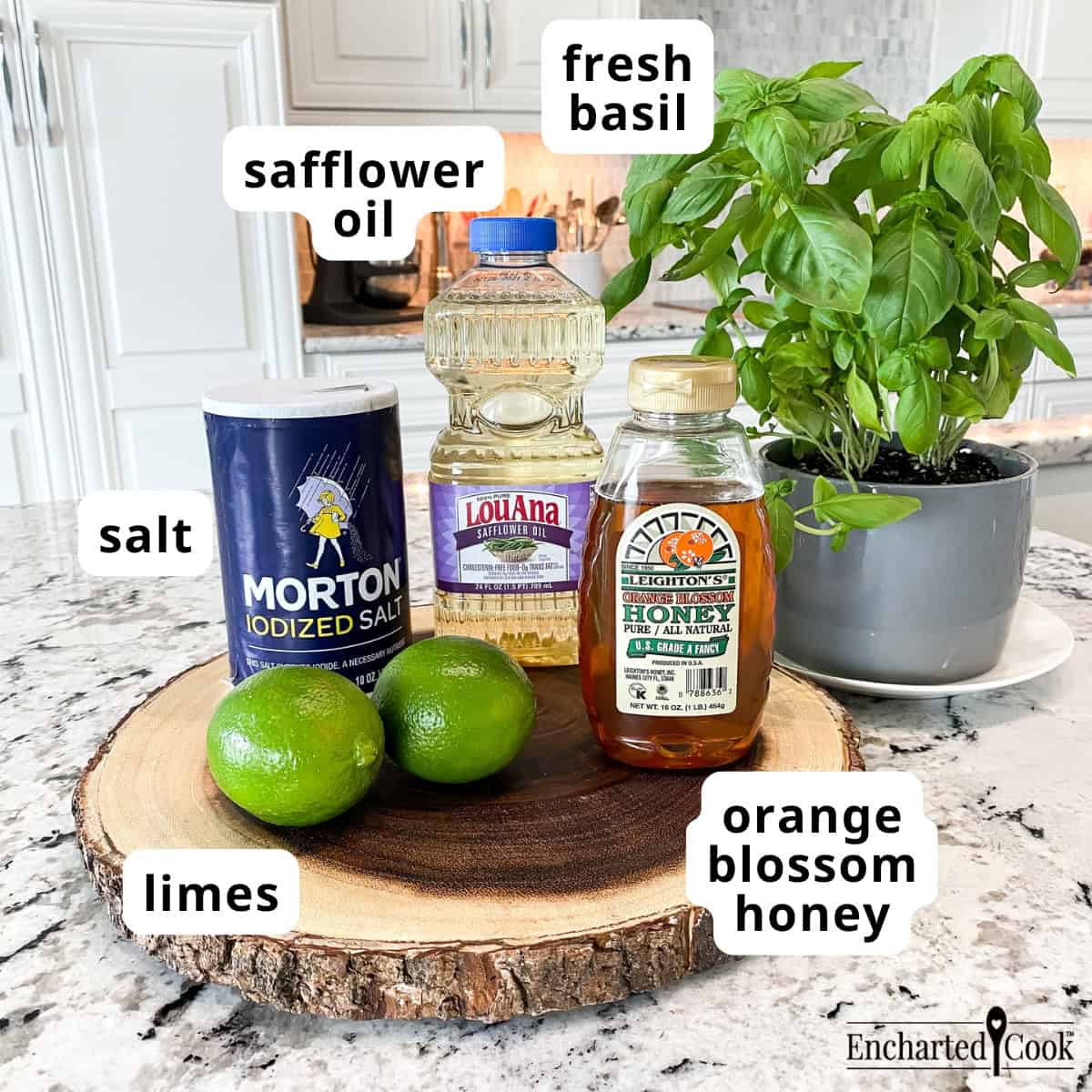 Honey Basil Dressing Ingredients, clockwise from top left: safflower oil, fresh basil, orange blossom honey, limes, and salt.