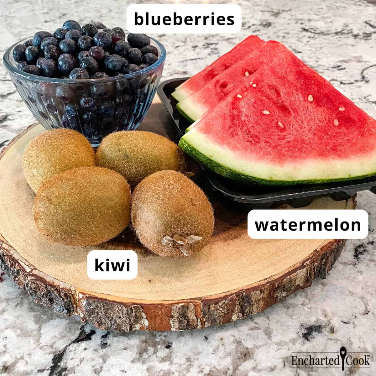 Watermelon and Berry Salad fruit ingredients, clockwise from top: blueberries, watermelon, and kiwi.