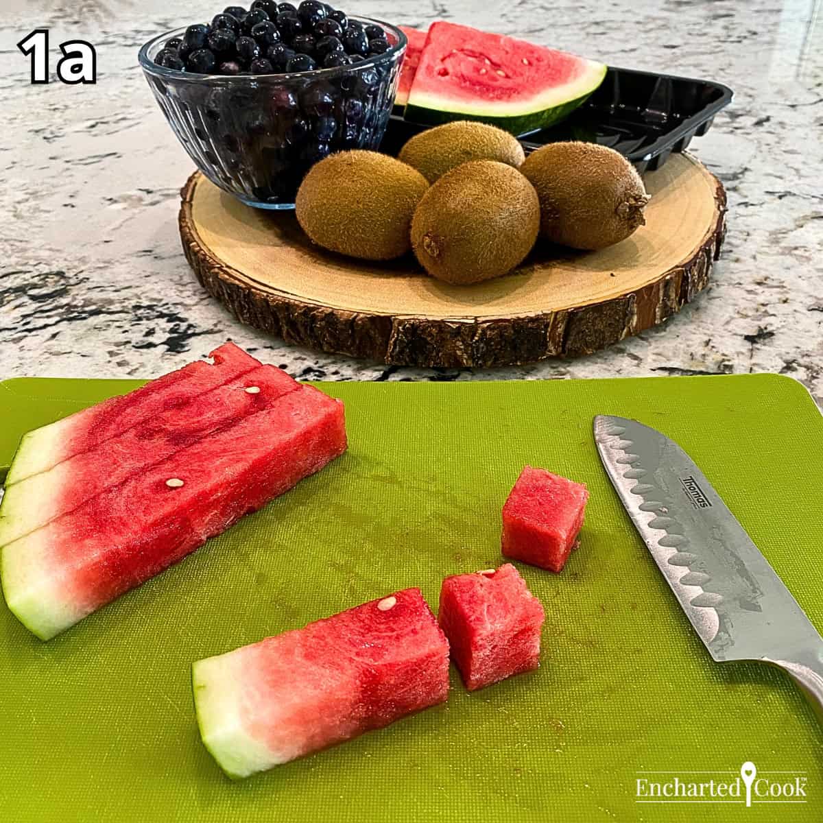 Process Photo 1a - Cutting the watermelon into bite-sized cubes.