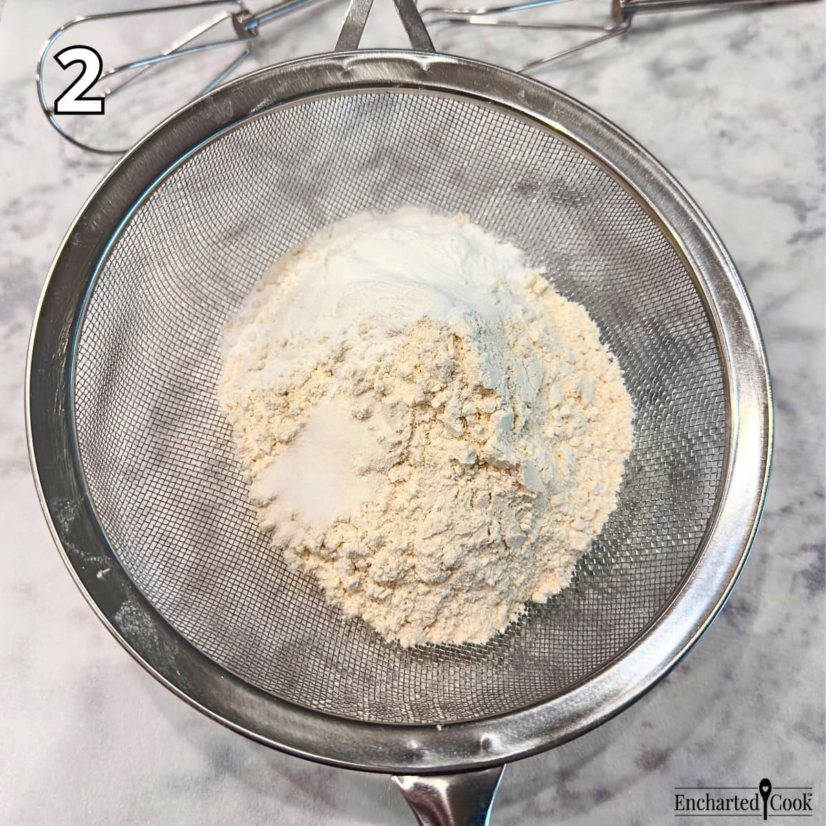 Process Photo 2 - Sifting together the dry ingredients: all-purpose flour, baking powder, and salt.