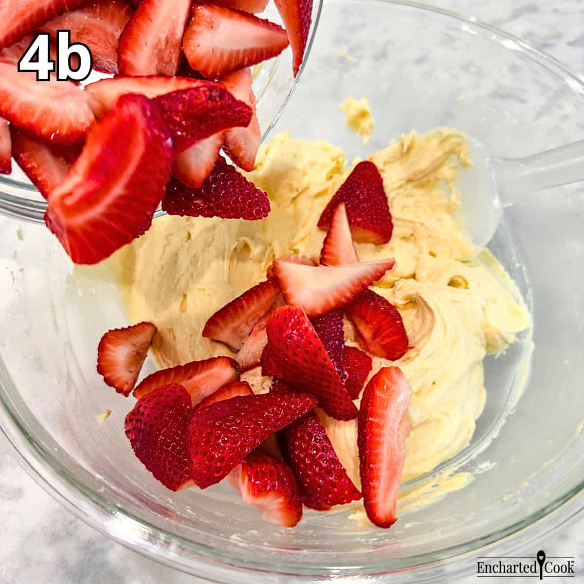 Process Photo 4b - Folding in cut strawberries into the buttery cake batter.