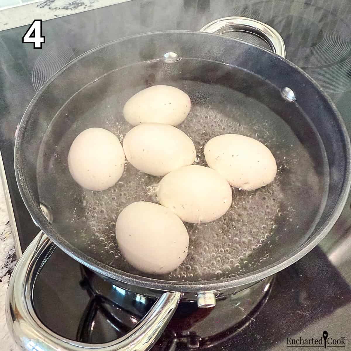 Process Photo 4 - Reduce the heat to medium to medium-high for a slow simmer and cook the eggs for 12 minutes. Don't let the eggs cook and a rolling boil or they will crack.