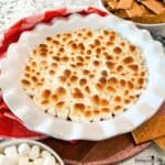 Smores Party Dip in a white ceramic pie plate.