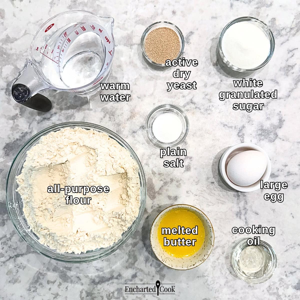 White Sandwich Bread ingredients, clockwise from top left: warm water, dry active yeast, white granulated sugar, plain salt, large egg, neutral cooking oil, melted butter, and all-purpose flour.