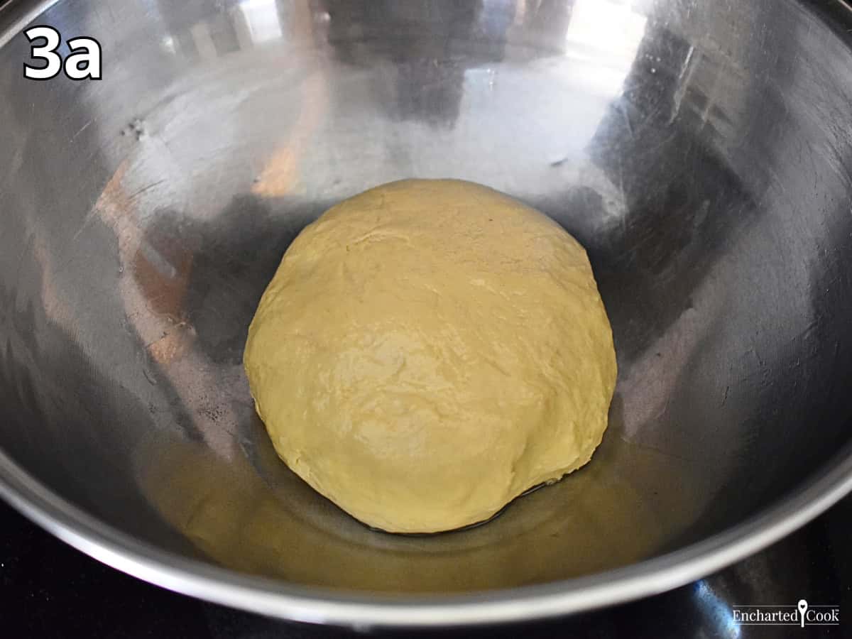 Process Photo 3a - The dough is formed into a smooth ball, placed in a large bowl, and set aside to rise.