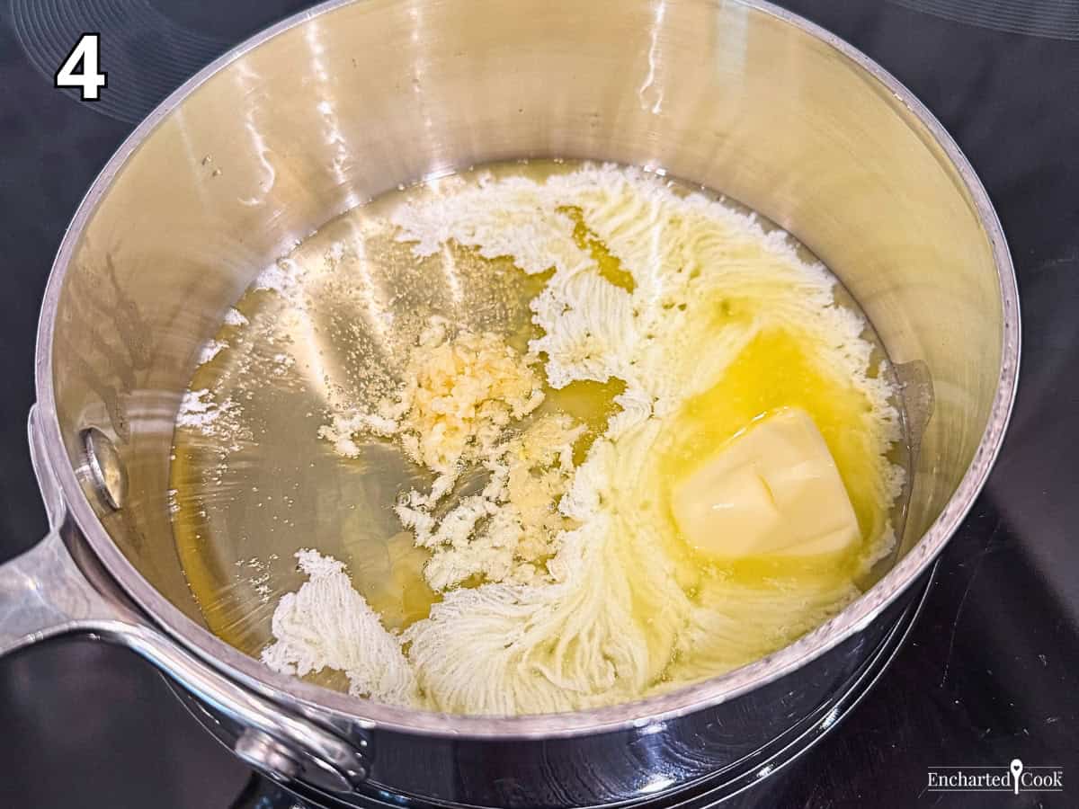 Process Photo 4 - Making the garlic butter in a small pan on the stove.