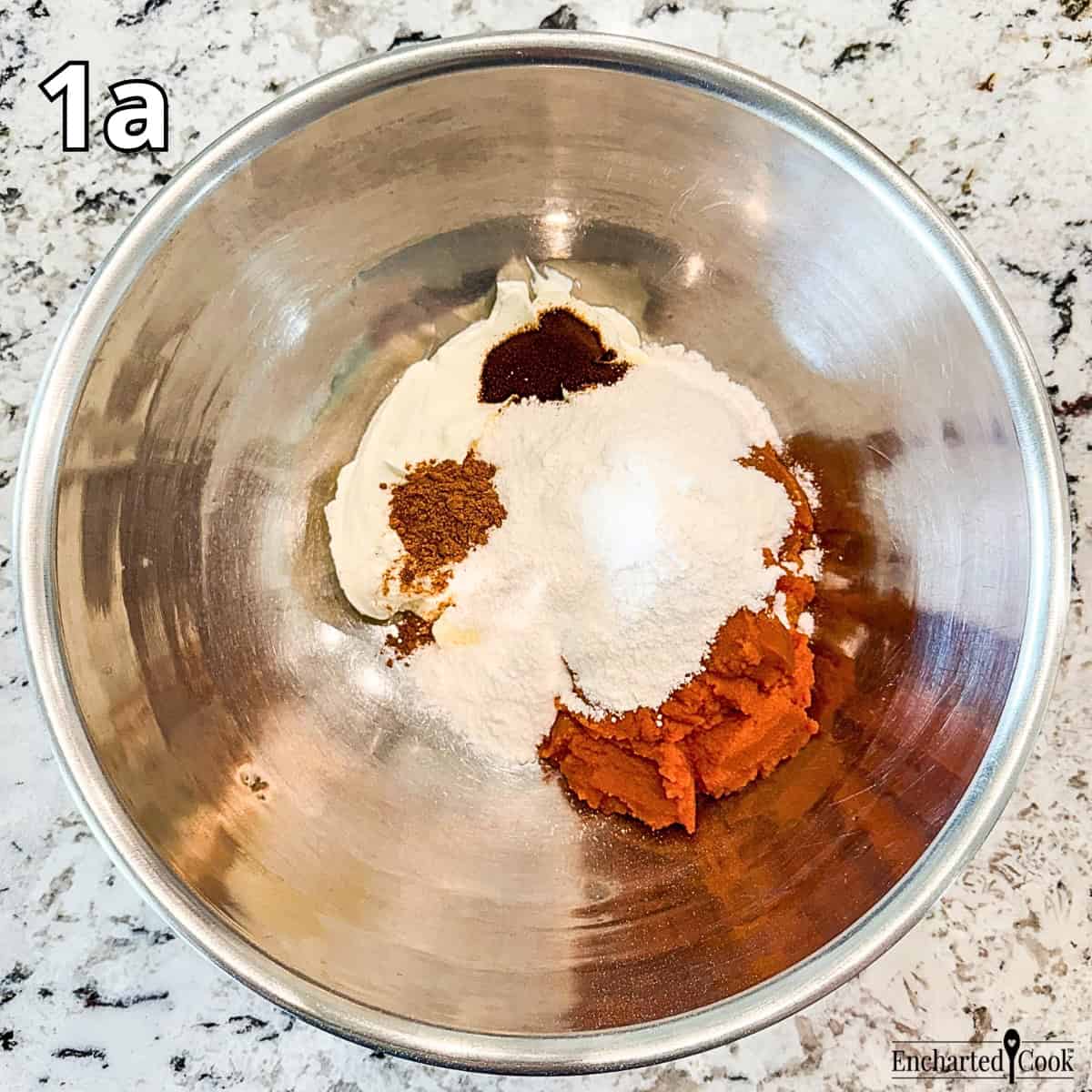 Process Photo 1a - In a large mixing bowl: Greek yogurt, pumpkin, instant pudding, espresso powder, and pumpkin pie spice.