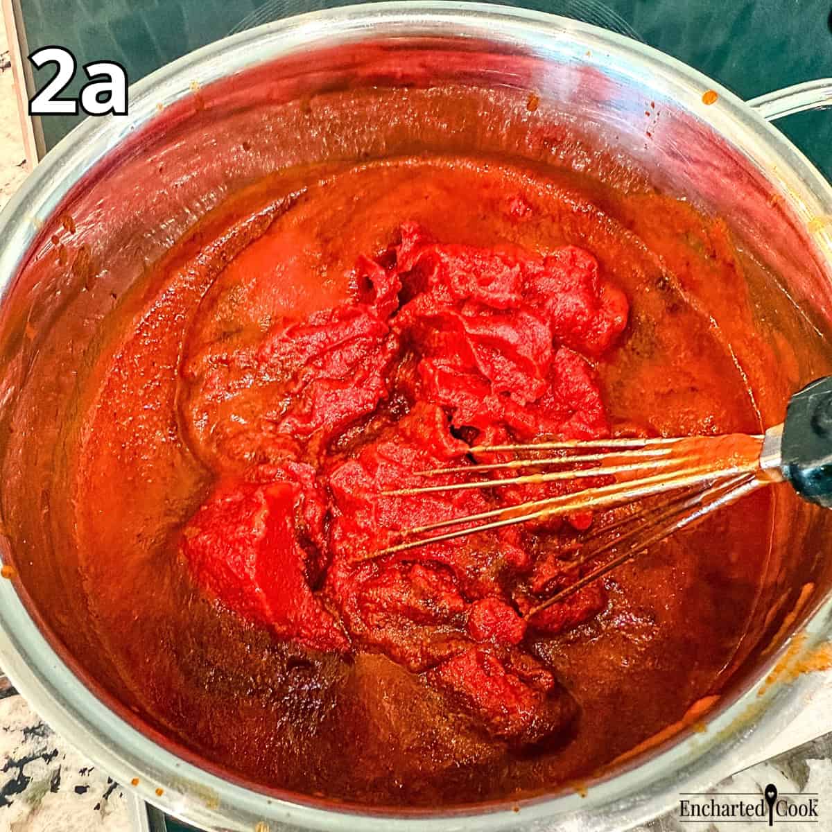 Process Photo 2a - Adding tomato sauce and tomato paste to the toasted seasonings.