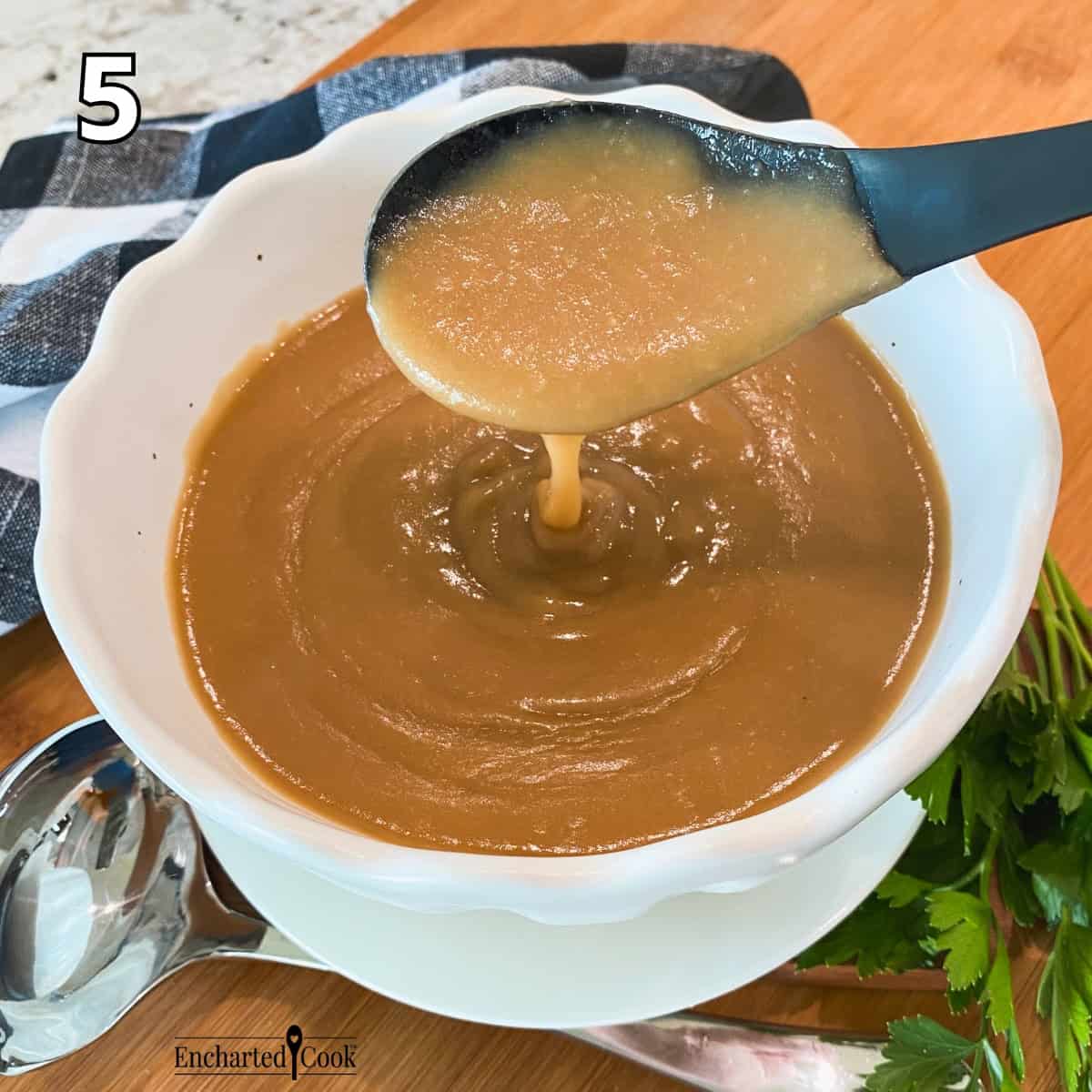 Process Photo 5 - The finished gravy in a white bowl.