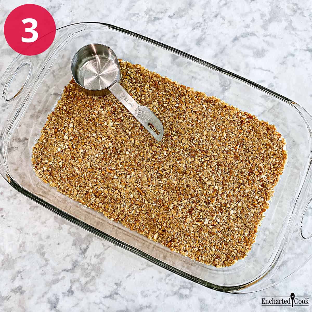 Process Photo 3 - The pretzel crust is pressed into the prepared dish.