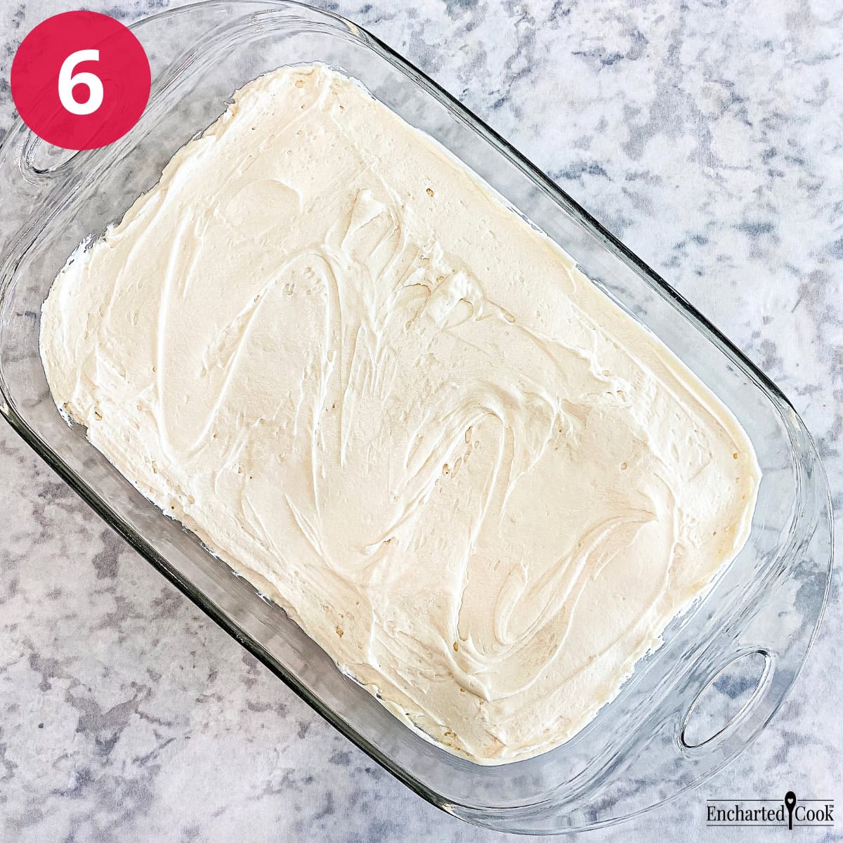 Process Photo 6 - A layer of cheesecake filling is spread over the pretzel crust.