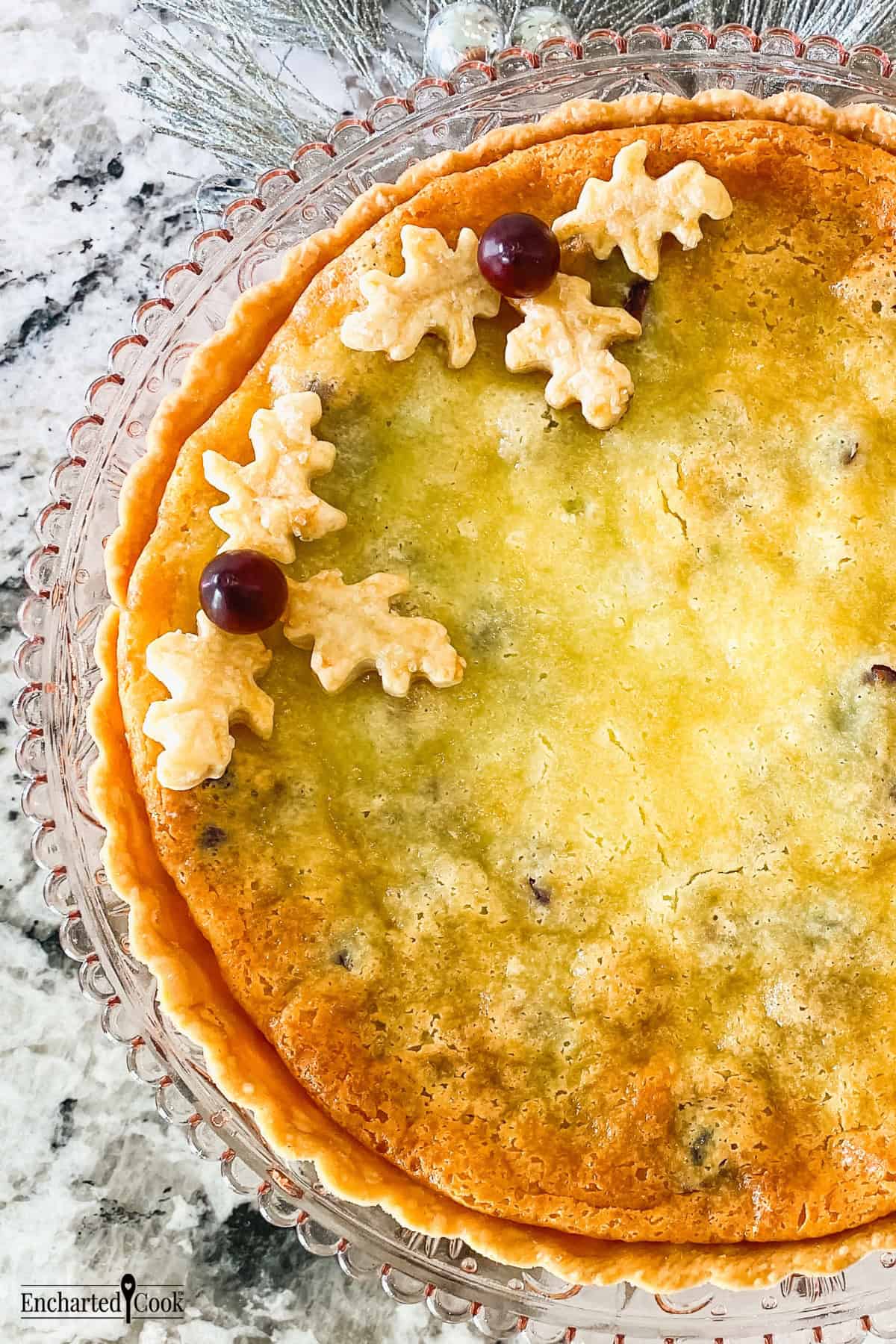 Cranberry Sugar Pie with pastry and fresh cranberry decoration.