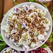 Creamy Grape Salad with a brown sugar and nut topping.