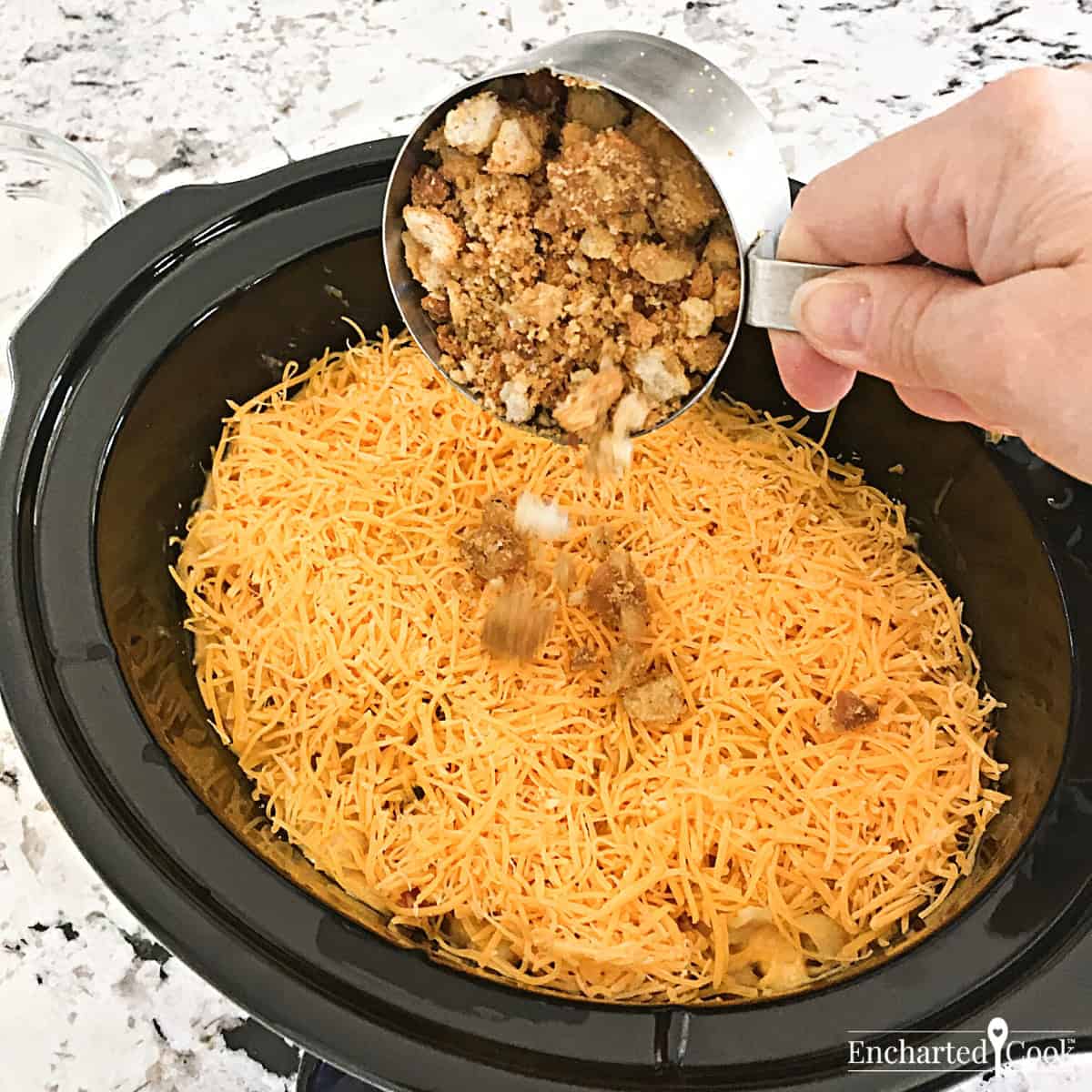 Optional Process Step - Add crushed croutons on top of the shredded cheese.