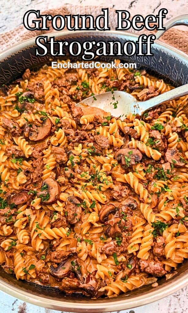 Ground Beef Stroganoff in a large pan with a spoon with text overlays.