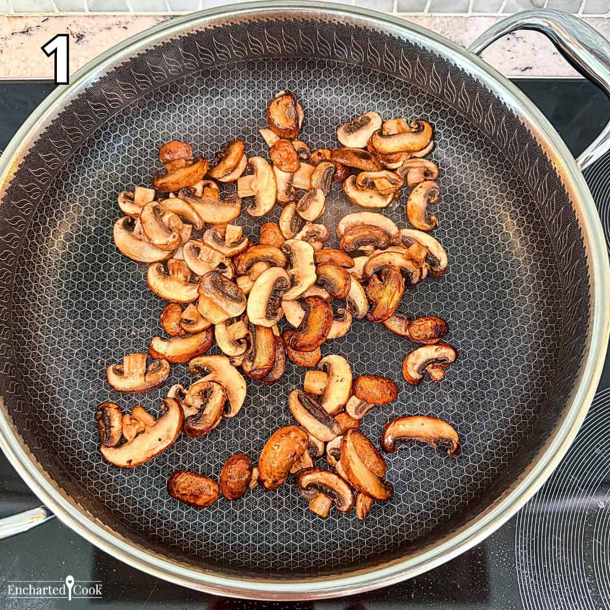 Process Photo 1 - Sautéing sliced mushrooms in butter.